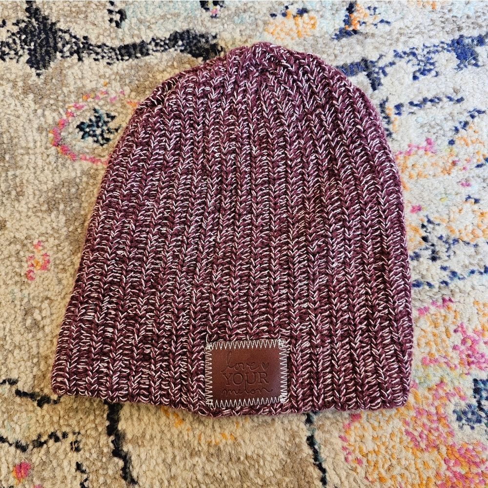 Love your melon beanie in maroon /white with brown leather patch